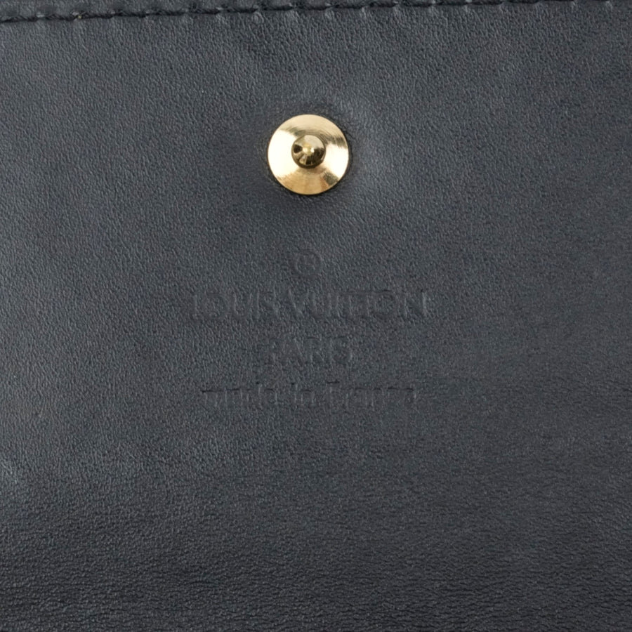 LOUIS VUITTON Porte Trésor International Wallet  M91836