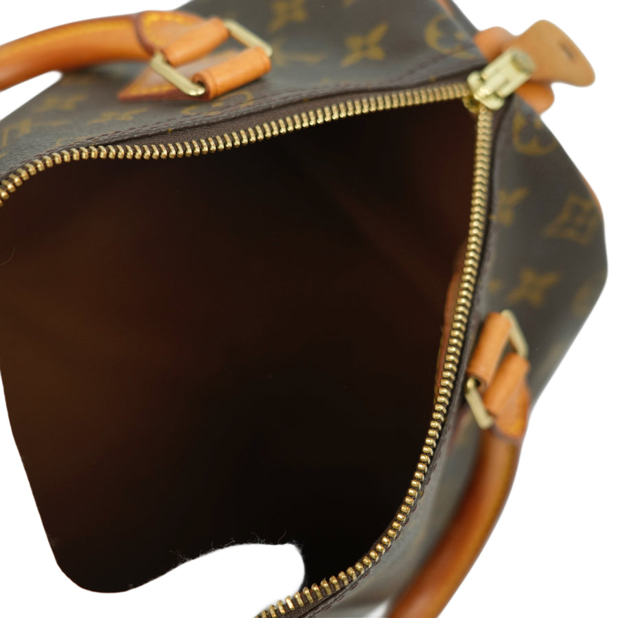 LOUIS VUITTON Monogram Speedy 25 Handbag