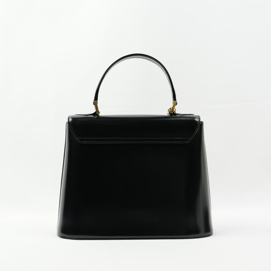 YVES SAINT LAURENT Leather Black Gold Handbag