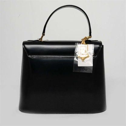 YVES SAINT LAURENT Leather Black Gold Handbag