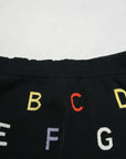 CHANEL 2001 Multi-logo Skirt